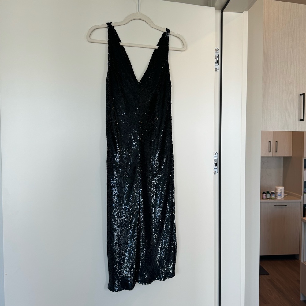 Pamella Roland black sequin dress size 2. Silk lining.